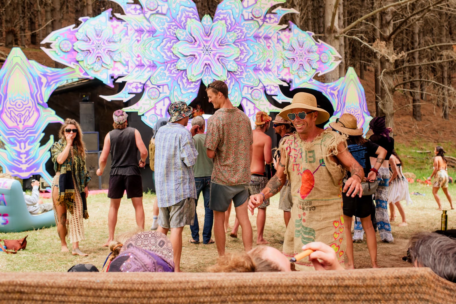 Daytime gathering in front of the forest stage
